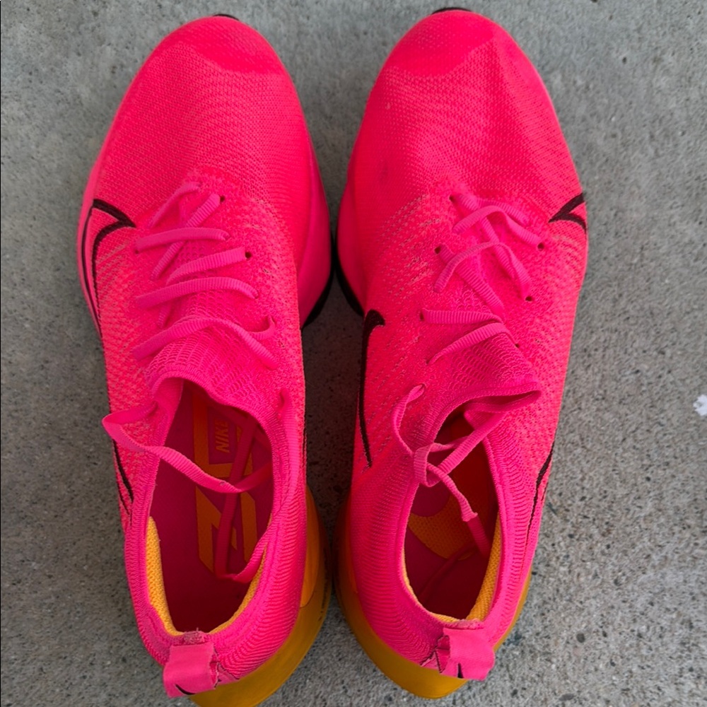 Nike Pink and Yellow Athletic Shoes Modern Design
